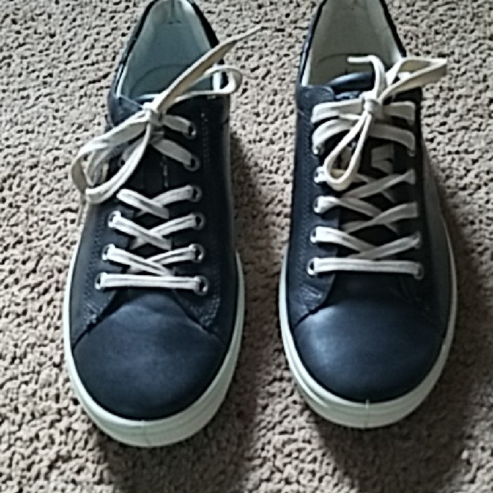 Stylish Black Sneakers with White Laces